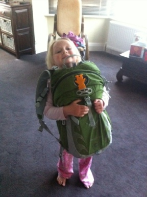 Lara carrying her rucksack