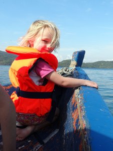 lara in lifejacket on boat